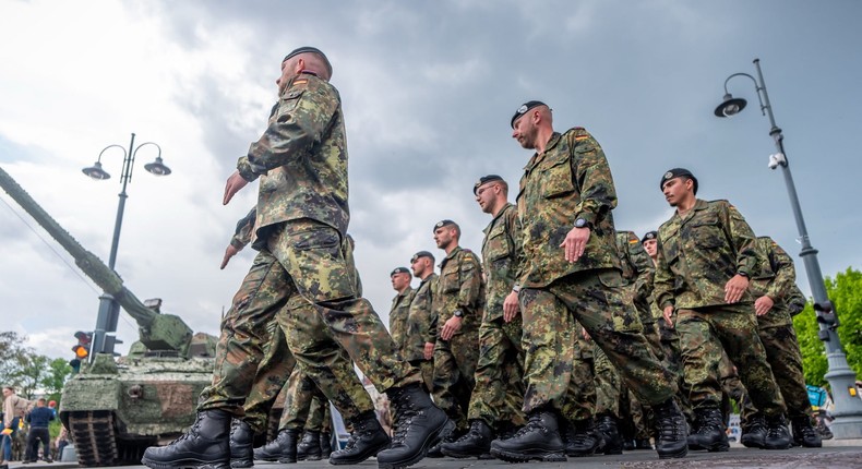 Soldiers walk in Vilnius, Lithuania, at a ceremonial roll call to mark the inauguration of Germany's 45th Armoured Brigade.Michael Kappeler/picture alliance via Getty Images